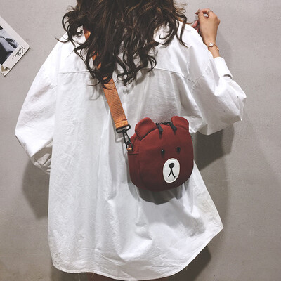 Mini bag female new 2019 Korean version of the wild girl canvas shoulder Messenger bag cartoon cute bear bag
Mini bag female new 2019 Korean version of the wild girl canvas shoulder Messenger bag cartoon cute bear bag