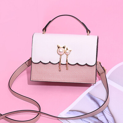 In summer the new small womens handbags are in vogue Korean mini handbags with one shoulder slung over one shoulder are versati
In summer the new small womens handbags are in vogue Korean mini handbags with one shoulder slung over one shoulder are versati