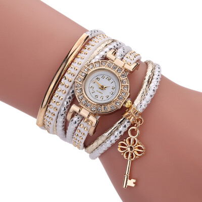 Creative fashion ladies winding bracelet watch gold key pendant quartz watch female models explosion models
Creative fashion ladies winding bracelet watch gold key pendant quartz watch female models explosion models