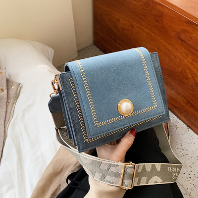 Wide shoulder strap small bag female new Korean version of the matte embroidery line shoulder slung casual wild small sq
Wide shoulder strap small bag female new Korean version of the matte embroidery line shoulder slung casual wild small sq