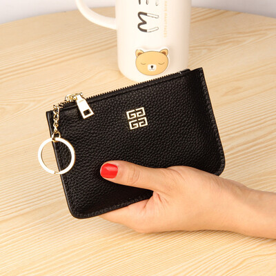The first layer of cowhide Europe&the United States big ladies leather short paragraph purse zipper mini lychee with ring key bag
The first layer of cowhide Europe&the United States big ladies leather short paragraph purse zipper mini lychee with ring key bag