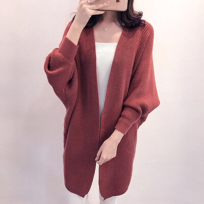 The 2018 autumnwinter new medium&long knitted cardigan womens thick sweater overcoat is draped over the womens dress
The 2018 autumnwinter new medium&long knitted cardigan womens thick sweater overcoat is draped over the womens dress