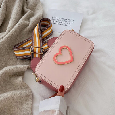 Qiao Bani 2019 new Korean version of chic fashion simple ribbon peach heart hit color small square bag shoulder diagonal female bag
Qiao Bani 2019 new Korean version of chic fashion simple ribbon peach heart hit color small square bag shoulder diagonal female bag