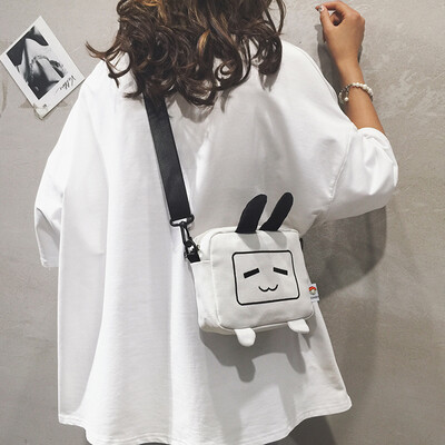Funny small bag female 2019 new Korean version of the cartoon Harajuku student canvas slung cute mini shoulder bag cute
Funny small bag female 2019 new Korean version of the cartoon Harajuku student canvas slung cute mini shoulder bag cute