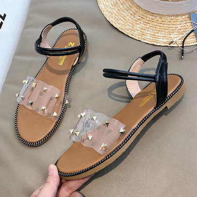 Korean version of student sandals female Xia Han version of 100 flat bottoms transparent open toes fashionable social riveted s
Korean version of student sandals female Xia Han version of 100 flat bottoms transparent open toes fashionable social riveted s