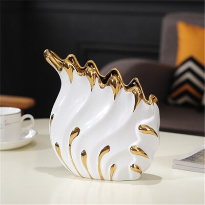 Modern art porcelain flowers vase home decor craft ornaments room decoration ceramic vase European home interior soft furnishings
Modern art porcelain flowers vase home decor craft ornaments room decoration ceramic vase European home interior soft furnishings