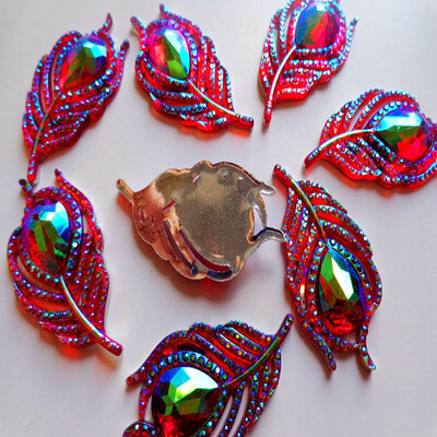 20pcs new fashion style sew on crystal red rhinestones flatback leaf feather shape 2550mm handsewing gem stones
20pcs new fashion style sew on crystal red rhinestones flatback leaf feather shape 2550mm handsewing gem stones