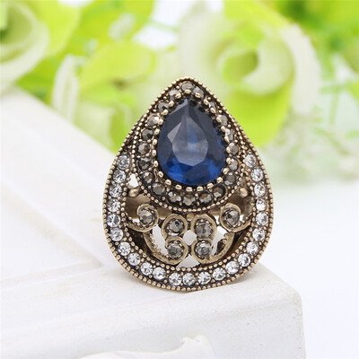 Vintage Turkish Hollow Flower Finger Rings Women Water Drop Resin Crystal Rings Antique Gold Color Jewelry Ethnic Wedding Ring
Vintage Turkish Hollow Flower Finger Rings Women Water Drop Resin Crystal Rings Antique Gold Color Jewelry Ethnic Wedding Ring