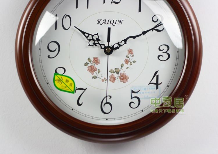 
                                        凯琴（KAIQIN）12寸中号欧式木头餐厅客厅挂钟进口静音机芯/1127 棕色                