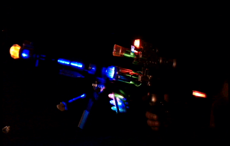 东发 电动玩具枪 儿童男孩玩具枪机关枪礼物带声光音乐投影 伸缩投影