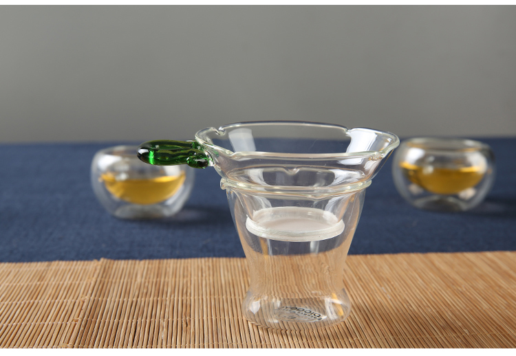 
                                        
                                                            品茶忆友 玻璃茶具 耐热玻璃绿把过滤茶漏茶滤茶器 JP-04                