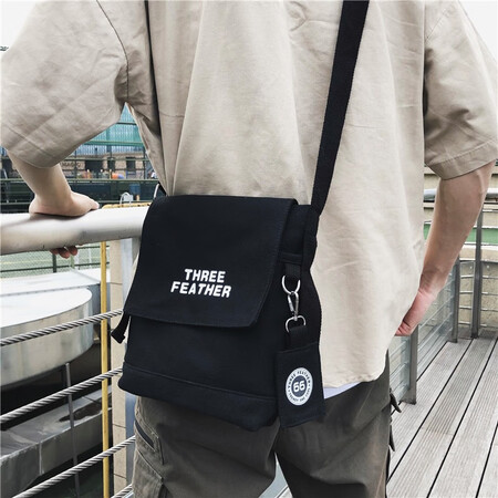 France and Germany Lu Messenger bag man bag 2020 new men's shoulder bag Japanese Harajuku style men's canvas satchel bag male students Tide brand casual bag small sports bag 1228 black trumpet France and Germany Lu Messenger bag man bag 2020 new men's shoulder bag Japanese Harajuku style men's canvas satchel bag male students Tide brand casual bag small sports bag 1228 black trumpet