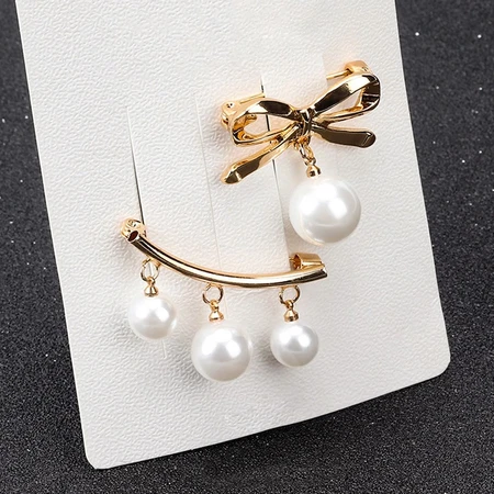 Flying flower brooch fixed clothes Korean version simple pearl brooch corsage women's accessories anti-light buckle all-match silk scarf buckle bow style gold Flying flower brooch fixed clothes Korean version simple pearl brooch corsage women's accessories anti-light buckle all-match silk scarf buckle bow style gold