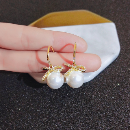 Edale earrings Korean temperament net red high-quality bow imitation pearl earrings girl earrings 2021 new trendy bow rhinestone earrings A1X702-A163 Edale earrings Korean temperament net red high-quality bow imitation pearl earrings girl earrings 2021 new trendy bow rhinestone earrings A1X702-A163