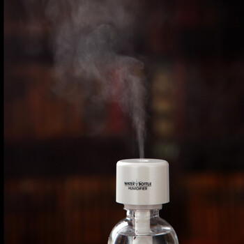 
                                        创意迷你usb水瓶盖加湿器 办公室桌面车载静音便携矿泉水瓶加湿器 水瓶盖加湿器 蓝色                