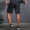 范斯蒂克 运动短裤男跑步健身透气宽松训练马拉松田径五分篮球裤速干 黑色印花中裤DMBF75702 L