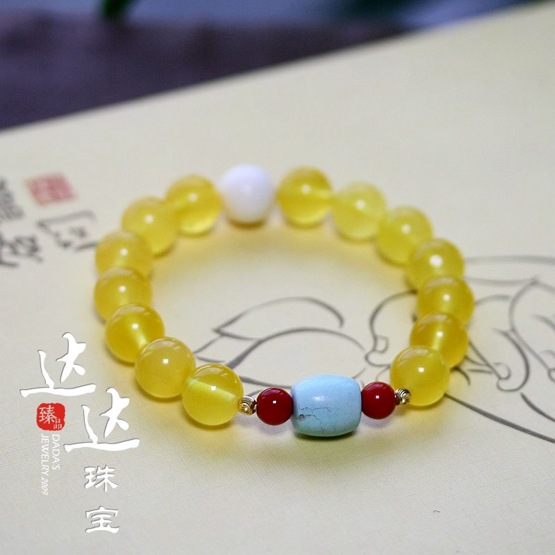 象牙手串配南红图片