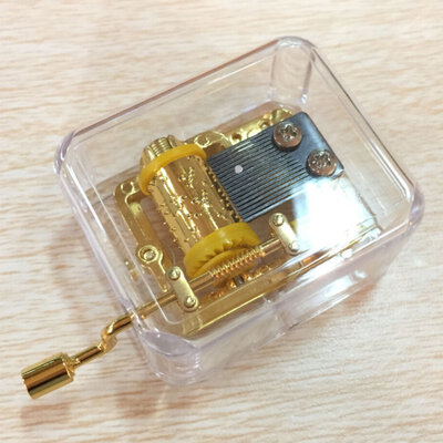 

Exquisite Clear Acrylic Square Gold Hand Cranked Gurdy 18 Note Music Box Play Castle in the Sky