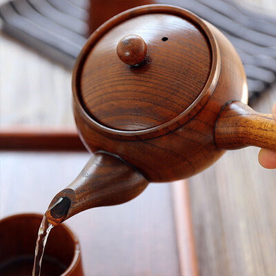 

Small Jujube Wood Side Handle Teapot with Stainless Steel Infuser 250ml