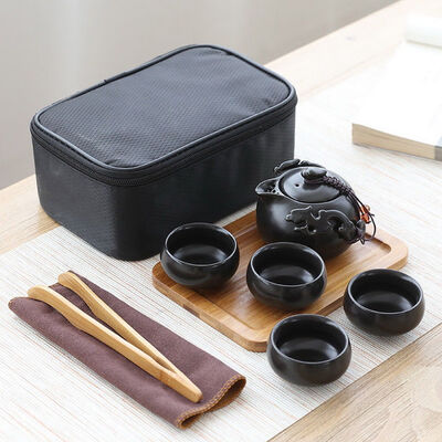 

Black Ceramic Travel Gongfu Tea Set Teapot Four Teacups Bamboo Tray Tongs Cloth