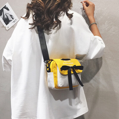 

2019 popular bag female new personality wild canvas shoulder Messenger bag net red girl bow small square bag