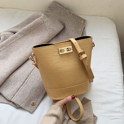 

North bag womens bag new model 2019 new bucket mother bag air 100 stone lines single shoulder oblique span bag women tide