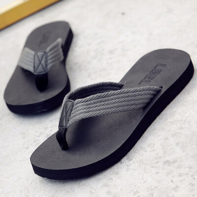 

Slippers mens summer non-slip beach shoes Korean version wear personality cool sand tide soft bottom pin flip flops