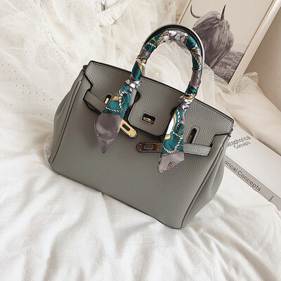 

Qiao Bani 2019 new European&American style fashion star lychee silk scarf platinum bag hand shoulder diagonal female bag