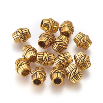 

Alloy European Beads Tibetan Style Lead Free&Cadmium Free Barrel Antique Golden Color about 11mm long 10mm wide