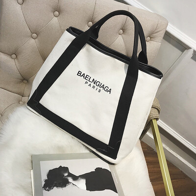 

Qiao Bani 2019 new Korean chic sleek minimalist canvas hit color bag shoulder bag diagonal cross tide handbag