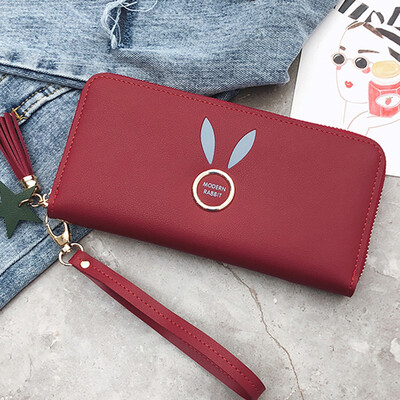 

Women holding wallets 2019 new Korean solid color zipper change clip wrist phone bag