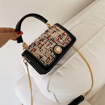 

Qiao Bani 2019 new South Korea Dongdaemun ins fashion contrast color flip bag hand strap shoulder diagonal tide handbag
