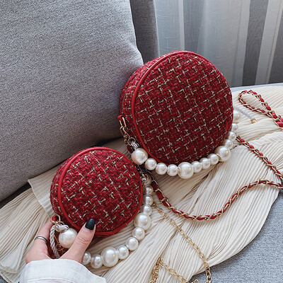 

Korean version of the small bag 2019 new fashion pearl hand bag small round bag one shoulder bag