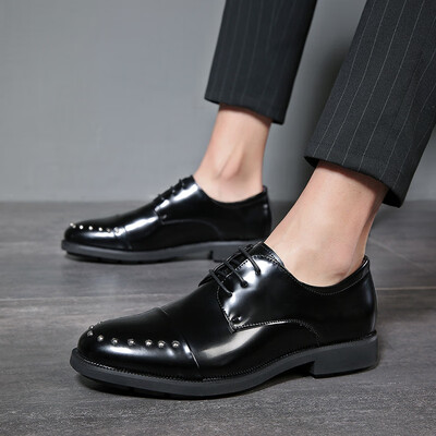 

Spring mens shoes Korean version of the trend of rivets personalized casual shoes youth thick bottom dress hair stylist shoes