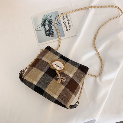 

Cute lion shoulder bag 2019 new style plaid canvas bag wild fairy small net red crossbody bag