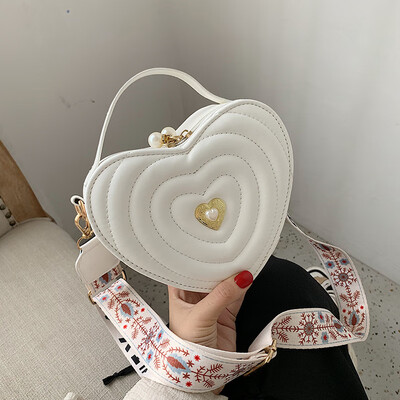 

Texture small bag female new Korean version of the wild shoulder bag wide shoulder strap trend heart-shaped Messenger ba