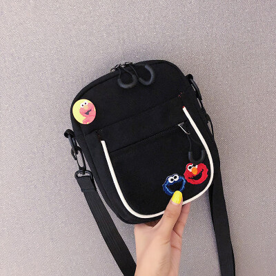 

2019 new casual fashion ugly sesame street canvas bag female cute cartoon simple versatile shoulder Messenger bag