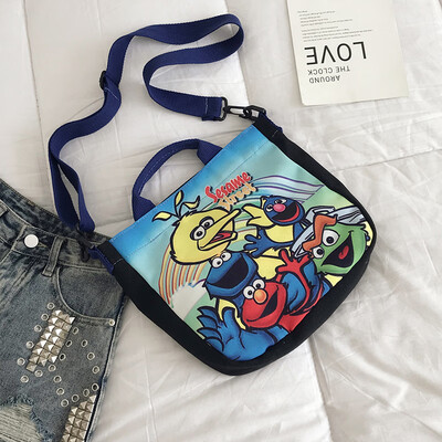 

2019 new casual fashion ugly sesame street portable canvas bag female cute cartoon wild shoulder Messenger bag