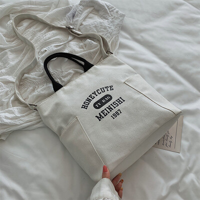 

New large-capacity portable canvas bag female 2019 new wave Korean version of the wild single shoulder slung fashion Tote bag