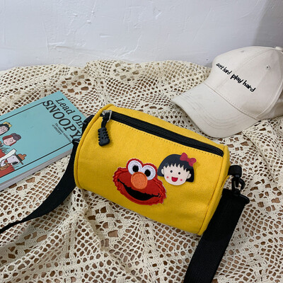 

2019 new cartoon simple versatile shoulder Messenger bag female casual fashion ugly sesame street canvas cylinder bag