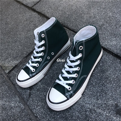 

Dark green high-heeled canvas shoes girl 1970ins street shooting Korean version of the original ulzzang board shoes girl