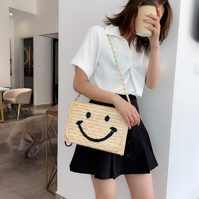 

Ins smiling face beach straw wrapping elegant handwoven straw wrapping lady straw skewed straw summer forest Handbag Shoulder