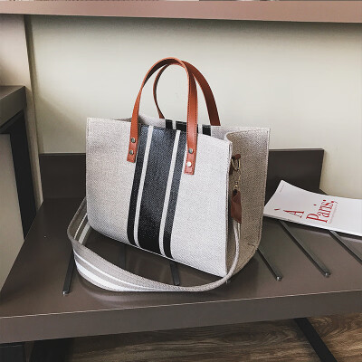 

Bag female 2019 new wave Korean fashion casual canvas wild portable wide shoulder strap shoulder slung tote bag