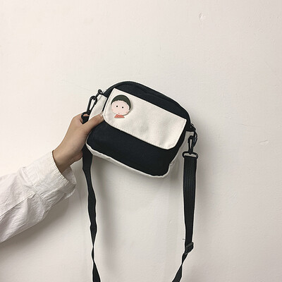 

Chic casual wild shoulder bag fashion temperament contrast color Messenger bag female 2019 new cartoon cute canvas bag
