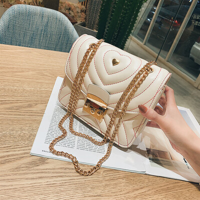 

Qiao Bani 2019 new Korean chic fashion embroidery line pig nose lock chain small square bag shoulder diagonal tide handbag