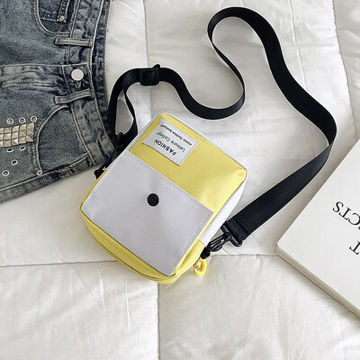 

Fashion personality letter crossbody bag 2019 new casual wild hit color shoulder bag female simple temperament canvas bag