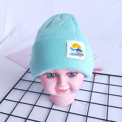 

Korean version of the new childrens wool hat tide children 100 knitted cover cap baby candy color warm hat autumn&winte