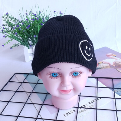 

Childrens wool hats Korea autumn&winter new warm smiling face knit cap head cap boys&girls baby hat candy