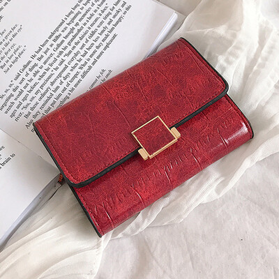 

Female short wallet students Korean version of simple folding 2019 new fashion multifunctional buckle change clip