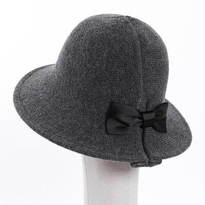 

Korean literary&artistic bow basin hat solid-colored wool knitted fisherman hat woman big edge foldable warm wool cap winter